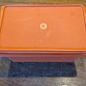 Orange Tupperware Storage Container